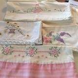 Vintage pillowcases, tea towels, hand embroidered linens