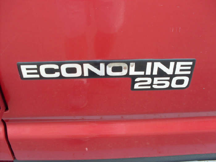 1998 FORD ECONOLINE CARGO VAN HAS STORAGE BINS IN BACK