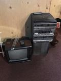 Portable TV and Yorx music system with radio, speakers, cassettes player, record player