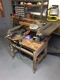 Table saw with planer and extra blades