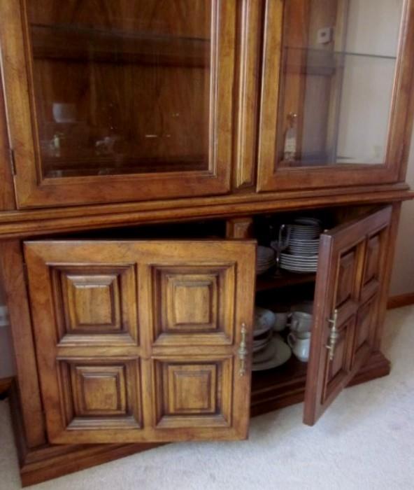 Thomasville lighted china cabinet with glass shelves, doors and sides; double door bottom storage with shelf.