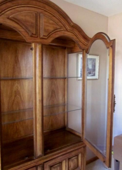 Thomasville lighted china cabinet with glass shelves, doors and sides; double door bottom storage with shelf.