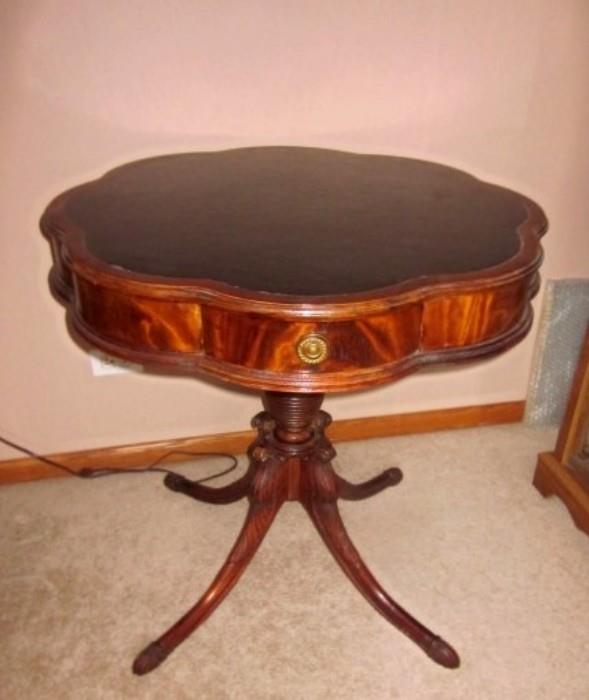 Vintage drum table, scalloped edge with one drawer and nicely carved pedestal base.