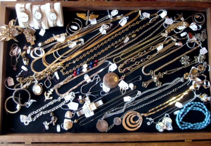 Costume jewelry, including a small amount of gold and sterling silver.