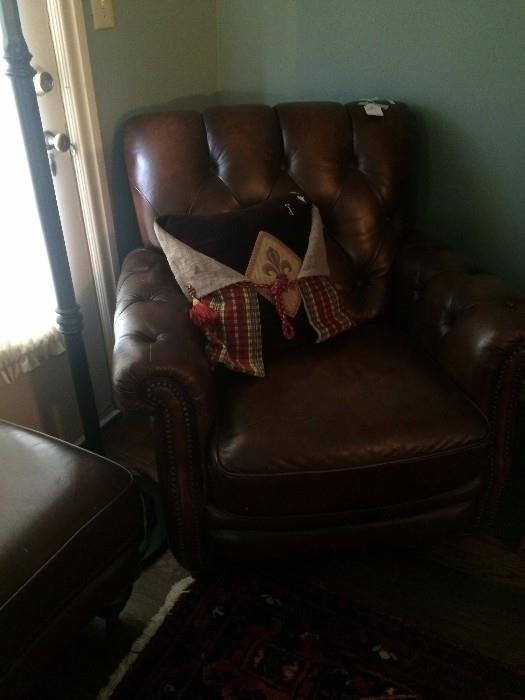 Brown leather chair with matching ottoman