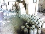 HUNDREDS OF GLASS JUGS WITH WHEAT GRAIN (SURVIVAL FOOD)