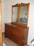 Sprague Carlton maple 9-drawer dresser and mirror.