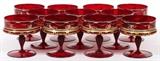 Lot#1036, MURANO RED GLASS & ENAMEL CHAMPAGNE/DESSERT COMPOTES, C. 1930, ELEVEN, H 4 1/2"Hand blown.  A set of 11, each is enamel decorated with nude dancers with veils.
