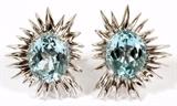 Lot#1056, 14KT WHITE GOLD & AQUAMARINE EARCLIPS, PAIR, L 1"Each features an oval cut aquamarine, centered in an abstracted 14kt white gold sunburst setting.  Weighing approximately 12.2 grams.