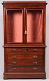 Lot#1066, ROSEWOOD BOOKCASE WITH DRAWERS, 19TH C., H 90", W 51", D 23"Two upper glass doors with two shelves. Four lower drawers. Has two keys. Original glass.