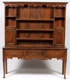 Lot#1071, TWO-SECTION OAK CUPBOARD, H 80", W 68", D 19.5"The upper section consists of seven shelves and two doors while the lower section has three drawers.