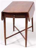 Lot#1076, ENGLISH MAHOGANY PEMBROKE TABLE, C. 1810, H 28", W 19", L 34"Depth of drop leaves: 8". Drop leaves have a shaped serpentine edge.  Circa 1840. Crossed stretchers connect four legs. One drawer and one faux drawer. From the collection of Dr. Marion Scott and Ann Scott, Grosse Pointe Shores.