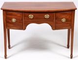 Lot#1086, ENGLISH MAHOGANY SERVING TABLE, C. 1900, H 30", W 42"Bow front, fitted with three cockbeaded drawers, raised on square tapering legs with spade feet.  Oak back.  Attractive brasses with urn motif. From the collection of Dr. Marion Scott and Ann Scott, Grosse Pointe Shores.