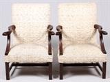 Lot#1085, ENGLISH CHIPPENDALE STYLE MAHOGANY ARMCHAIRS, PAIR.Each has an upholstered back and seat flanked by open arms, raised on rectilinear supports joined by stretchers.  Measuring H.36", W.26".