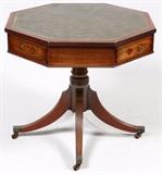 Lot#1087, REGENCY STYLE MAHOGANY OCTAGONAL TABLE, H 29", W 31"Octagonal, with a green, tooled leather top and four drawers.