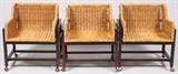 Lot#1097, MID-CENTURY MODERN WOOD & WICKER OCCASIONAL CHAIRS, THREE, H 28"Having wood frames with wicker insets and casters.  Measures H.28" x 24" x 24".