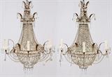 Lot#1114, CRYSTAL & GILT METAL THREE-LIGHT MIRRORED SCONCES, PAIR, H 30", W 24"Metal frame with mirrored back, fitted with three lights each, and adorned with crystal beads and swags.