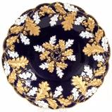 Lot#1134, MEISSEN COBALT & FIRED GOLD PORCELAIN BOWL, C. 1950, DIA 11"Round porcelain bowl with a scalloped rim, cobalt blue ground embossed with oak leaves and acorns of gold and white; stamped in blue under glaze with crossed swords, impressed 56 and D 174 (see additional photo). From the collection of Dr. Marion Scott and Ann Scott, Grosse Pointe Shores.