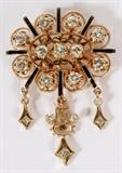 Lot#1221, 1.50CT DIAMOND, ENAMEL & 14KT YELLOW GOLD BROOCH, W 1 1/4.A Victorian style brooch, featuring 1.50ct round diamonds with accenting black enamel bars and three diamond tassels, set in 14kt yellow gold.  Measuring H.1 3/4" x W.1 1/4".  The diamonds are G-color and VS-2 clarity.  Weighing approximately 11.6 grams.