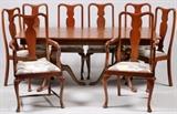 Lot#1358, QUEEN ANNE STYLE DINING TABLE &SET OF CHAIRS (8)Extension style double pedestal table with one leaf @16". Table measures 40" x 72". Eight chairs include two with open arms and eight side style. Circa 1940. From the collection of Dr. Marion Scott and Ann Scott, Grosse Pointe Shores.