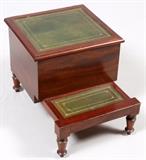 Lot#1361, REGENCY STYLE MAHOGANY LOW TABLE, H 17", W 17", WITH HINGED LEATHER TOP..Green tooled leather top. On short legs. Top is hinged and opens for storage. Inside is lined with felt. Front legs pull forward and become a lower step. From the collection of Dr. Marion Scott and Ann Scott, Grosse Pointe Shores.