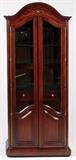 Lot#1370, MAHOGANY TWO-DOOR CURIO CABINET, H 81", W 32", D 17", ILLUMINATING INTERIOR.The illuminated glass two door mahogany curio cabinet features four shelves, one full length drawer and two lower interior doors which open to reveal a storage space.