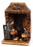 Lot#1458, MAJOLICA POTTERY FIGURAL GROUPING, H 16", L 10.75" D 9.25"Depicting a man and boy seated in front of a fireplace.  Unmarked.