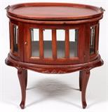 Lot#1533, MAHOGANY CURIO TABLE, H 30", W 29", D 19"Modern. Oval top lifts.