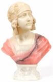 Lot#2, G. PINESCHI (ITALIAN), CARVED MARBLE & ALABASTER BUST OF LADY, C. 1925, H 18", 'ORIENTAL GIRL'In pink and cream, carved as a bust of a young woman in art deco fashion.  Measuring overall H.17 1/2", base measures H.3 1/2".  Titled on base 'Oriental Girl', and signed at back of the left shoulder, possibly "G. Pinerchi" 
