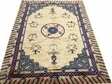 Lot#45, ANTIQUE CHINESE HAND WOVEN WOOL RUG, W 6', L 9'Having a pink ground, 3 borders, with the primary border having pink, blue and green hash marks, geometric corner brackets with a central round floral and geometric medallion along with flowering trees and vases with bouquets, throughout the field.