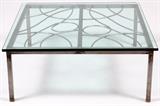 Lot#121, MID-CENTURY MODERN METAL AND GLASS COFFEE TABLE, H 16", L 42", D 42"Having welded joints and a glass top.