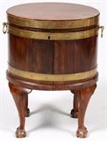 Lot#123, CHIPPENDALE STYLE CARVED MAHOGANY WINE CELLAR, 18TH C ELEMENTS, H 29", L 21", D 16"Having a mahogany exterior with an oak liner. Brass bound with ball and claw feet.