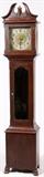 Lot#130, MAHOGANY TALL CASE CLOCK, C.1920, H 87", W 18", D 11"Swan neck open pediment with urn form finial, with a pendulum and weights. Brushed steel and brass face with Arabic numerals. Bracket and paw feet.