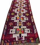 Lot#133, TURKISH BESSARABIAN, HAND WOVEN WOOL RUG, W 5', L 12'Turkish Bessarabian hand woven wool rug having a burgundy ground, one border in red with grey and burgundy segments with small geometric figures. Five Ivory geometric medallions spaced along the length of the field with rectangular figures.