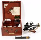 Lot#147, KEUFFEL & ESSER CO. IRON & BRASS U. S. NAVAL SEXTANT, EARLY 20TH C., ENCASED..Serial number 28938, fitted in a mahogany case with "Liet. A. Langfield U.S.N. 553" engraved at the inset shield-form reserve at the hinged cover.  The case measures H.5 1/2" x 9 3/4" x 9 7/8".