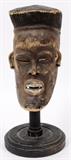 Lot#324, AFRICAN, CARVED WOOD MASK, H 8", W 4"Showing teeth.