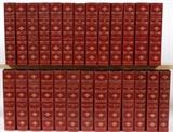 Lot#367, WILLIAM MAKEPEACE THACKERAY, NOVELS, CORNHILL EDITION, 26 VOLUME SET, 1923, H 8 1/2" X 5"William Makepeace Thackeray leather bound volumes including: "Vanity Fair", "Denis Duval", The Four Georges", "The Virginians", etc. Pub. Charles Scribner's Sons, New York, 1923. Each having 1/4 red leather binding and leather corners, gilt upper edges and hand cut pages.