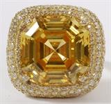Lot#2052, JUDITH RIPKA 40.00CT CANARY STONE & 3.50CT DIAMOND RING, SIZE 10 1/2,,Featuring a central 40.00ct canary stone, with 3.50ct diamond surround set in 18kt yellow gold.  The diamonds are G-color and VS-2 clarity.  Weighing approximately 25.9 grams.