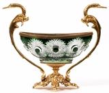 Lot#2071, MARTIN BENITO, FRENCH CUT CRYSTAL AND BRONZE CENTERPIECE, H 14 1/2", L 18", DIA 6 3/4"Green and clear crystal with bronze swans flanking the bowl coming from base. Signed and stamped.