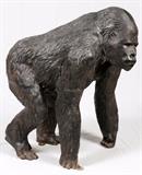 Lot#2138, PATINATED METAL SCULPTURE, H 49", L 45", D 20", GORILLA.A patinated metal sculpture of a crouching gorilla.  Suitable for outside use.