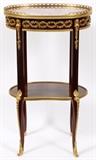 Lot#2143, FRANCOIS LINKE (FRENCH, 1855-1946), GILT BRONZE, MAHOGANY & MARBLE TOP TABLE, C.1900-1925, H 30", L 17", D 12"Having a rouge marble top, bronze gallery and ormolu, a single drawer and lower shelf. Signed.  H 30", L 17 1/2", D 12 1/2"
