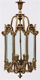 Lot#2182, FRENCH BRONZE CHANDELIER CIRCA 1920 H 30" DIA 14", ELECTRIFIED.Eight hand beveled glass panels. Originally fitted for candles. Now electrified.
