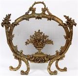Lot#2254, BRONZE FIREPLACE SCREEN, H 27 1/2", L 29"Having a central cornucopia and accenting floral bouquet designs.