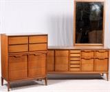 Lot#2410, MID CENTURY MODERN DRESSERS AND MIRROR, TWO PIECES.Featuring a tall five-drawer dresser H 45.5", L 36", D 18" and a long nine-drawer dresser H 41", L 64", D 18" accompanied by a mirror H 44.5", L 30.5".  Each with a Formica top.