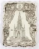 Lot#2277, ENGLISH VICTORIAN STERLING CARD CASE, BIRMINGHAM, 1870-71, L 4"Hallmarks: Sterling Silver, Birmingham, Queen Victoria, 1870  cartouche believed to be from Frederick Marson.  Beautifully etched with, what is believed to be, a rendering of St. Martins Church, Birmingham, UK.  Also having a coat of arms depicting a lion surmounted on a crown.  Weight 1.8 ozt.  Measures L.4" x 2 3/4".