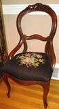 Pair of balloon back Victorian needlepoint chairs