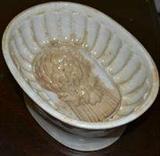 Ironstone jelly mold with wheat sheaf and finger decoration border. Late 19th century