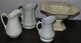 Collection of ironstone pitchers, some with molded relief decoration