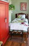Guest bedroom - featuring a pair of French style twin beds in walnut.