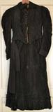 Vintage clothing with black Victorian dress and waist coat.